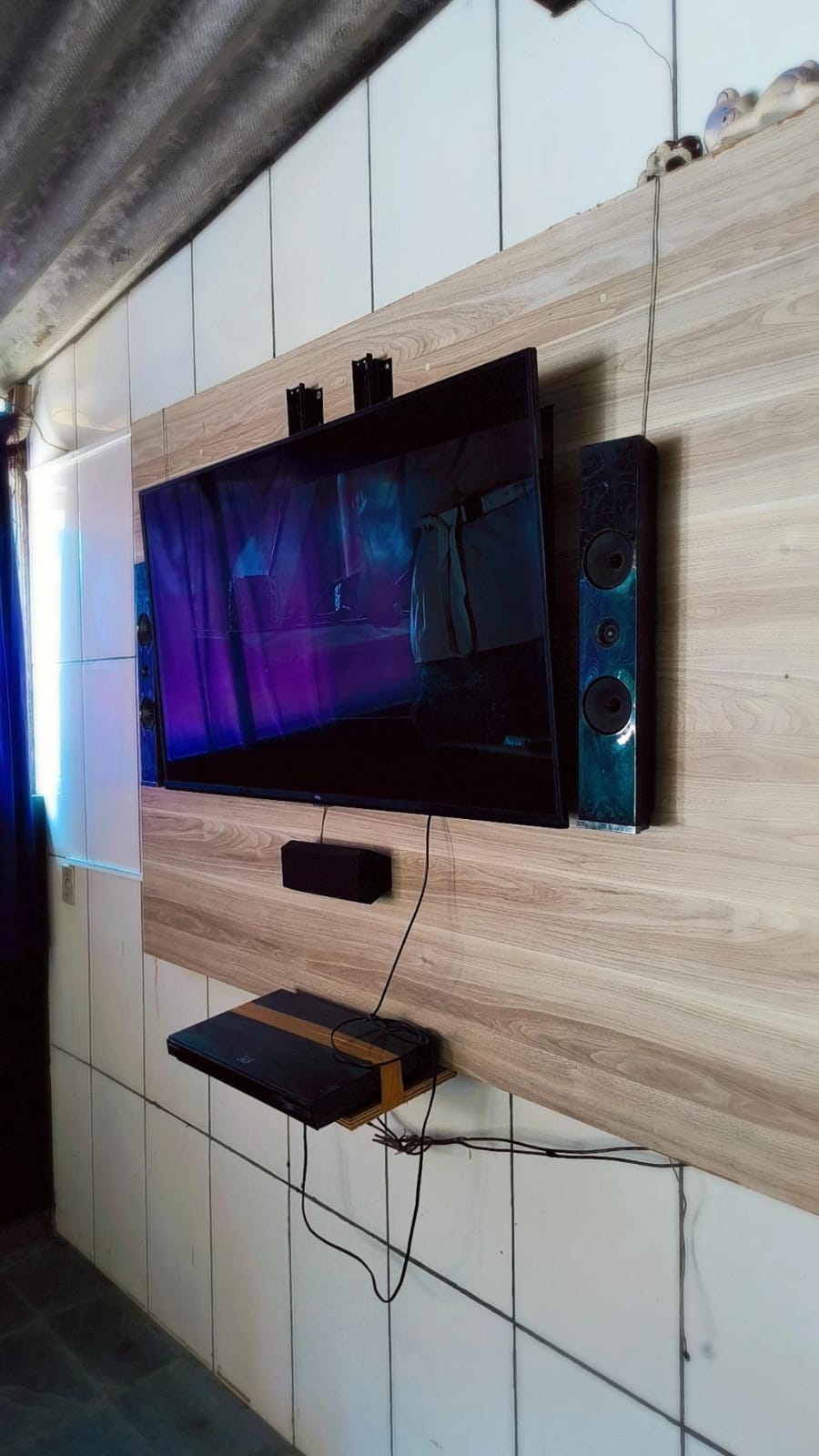 Sala de convivência com TV